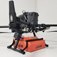 Compact drone-mounted Zond Aero 500 ground-penetrating radar (GPR) system.